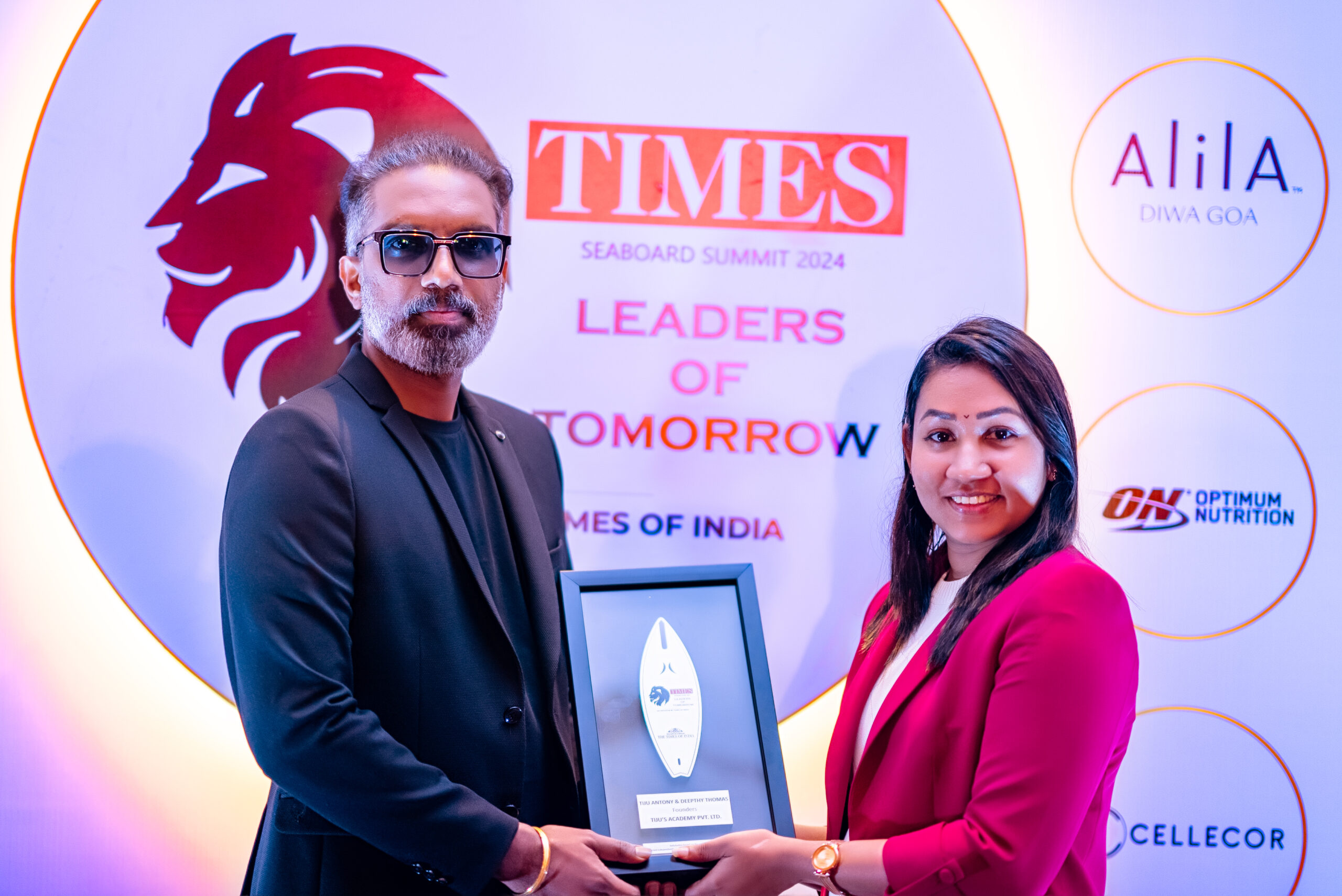 Tiju's Academy receiving the Times of India award for best language institute in Kerala